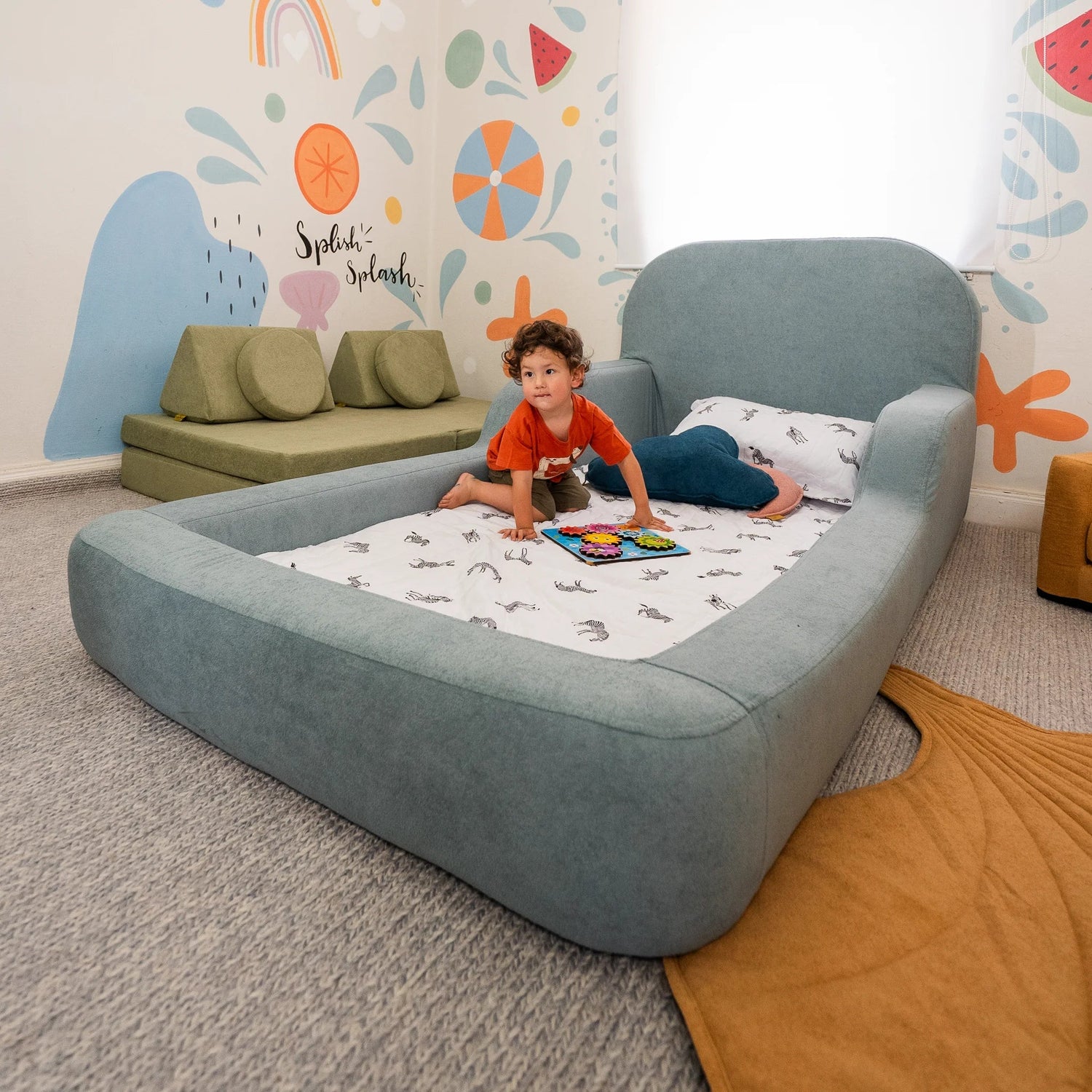 Little Duck Montessori Bed in Sky Blue, showing the foam design up close